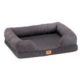Gray pet bed with a brown label on a white background