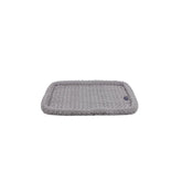 Gray textured bath mat on a white background
