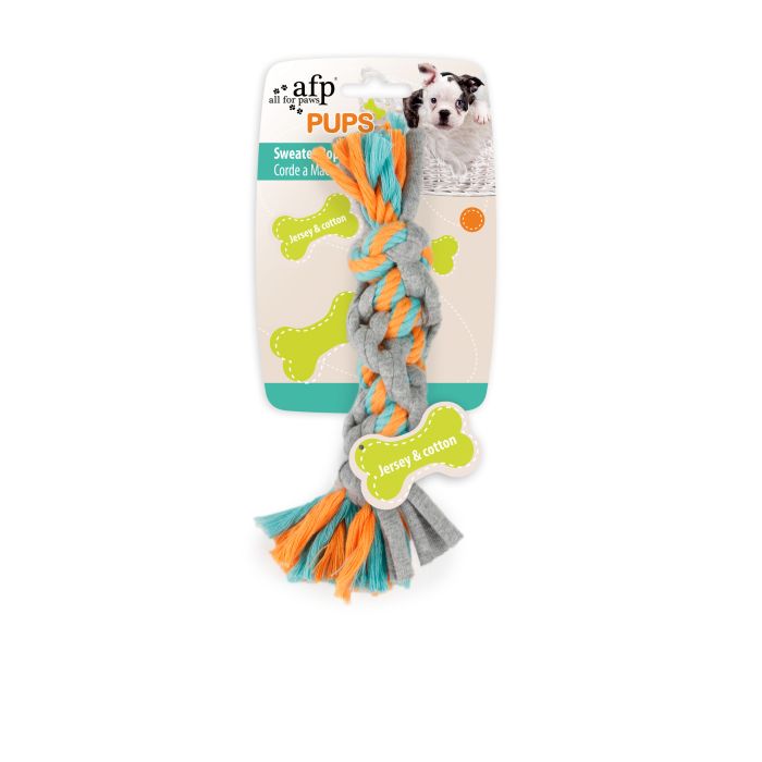 Dog toy with colorful braided rope on a white background
