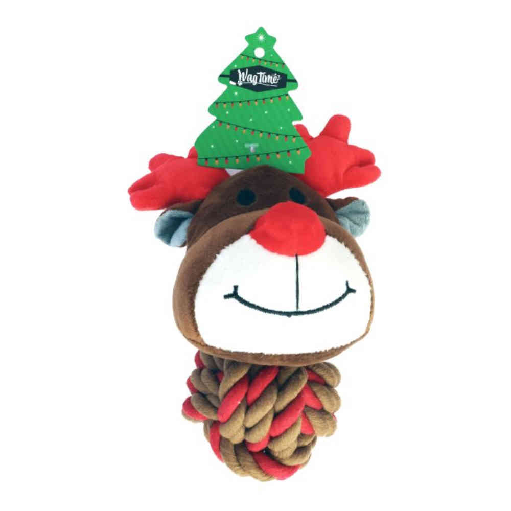 Dog toy with reindeer head and Christmas tree on a white background