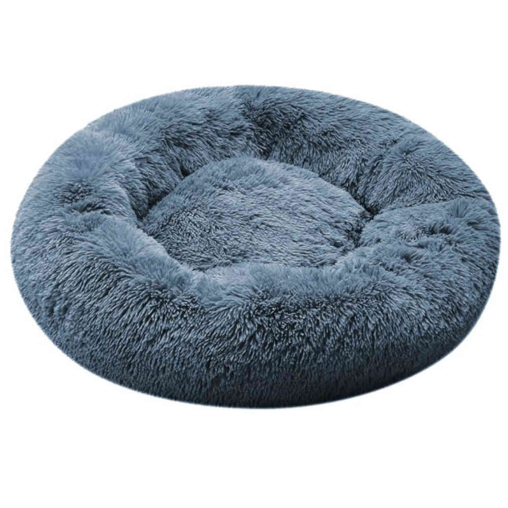 Blue fluffy donut pet bed on a white background