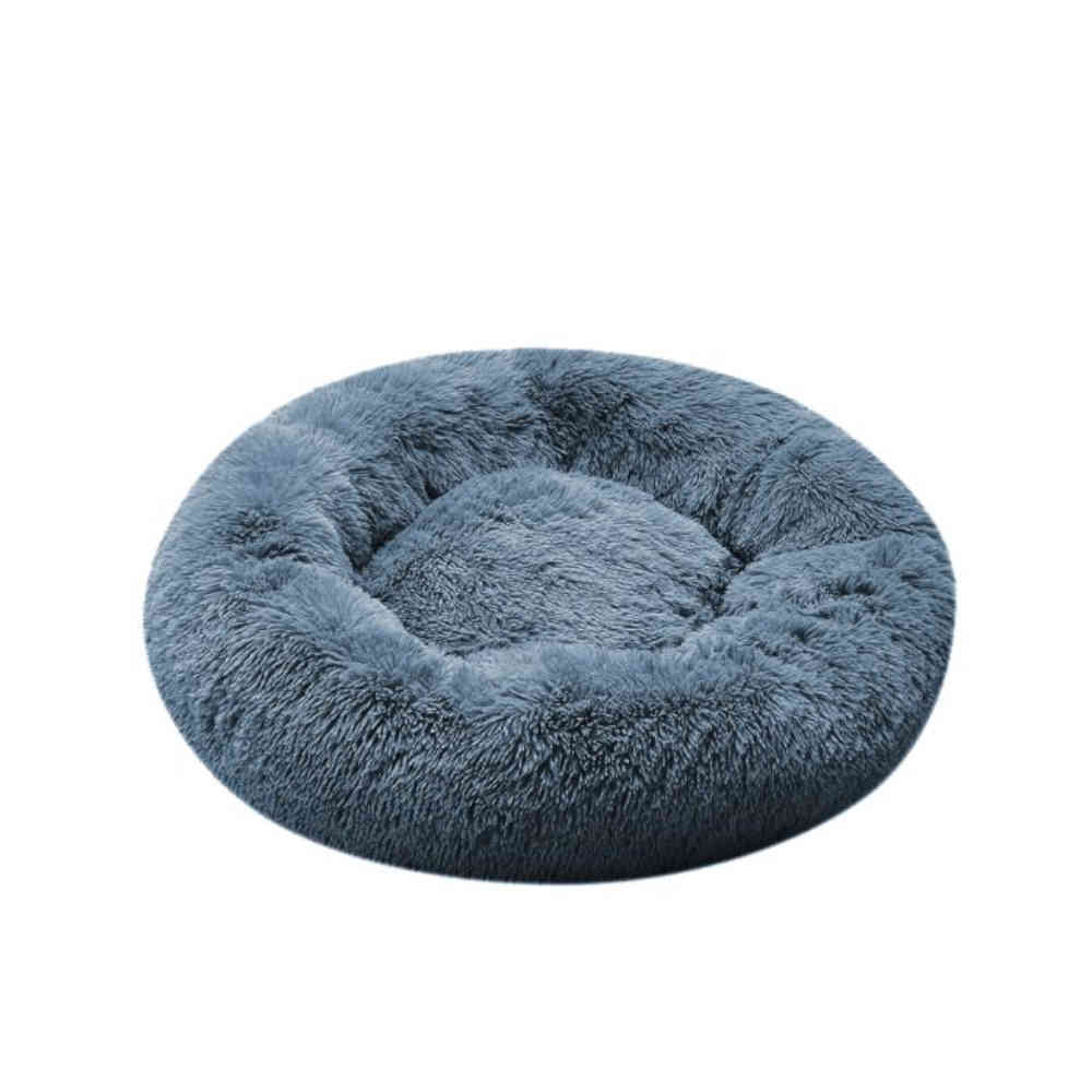 Blue fluffy donut pet bed on a white background
