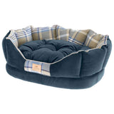 Blue pet bed with plaid lining on a white background