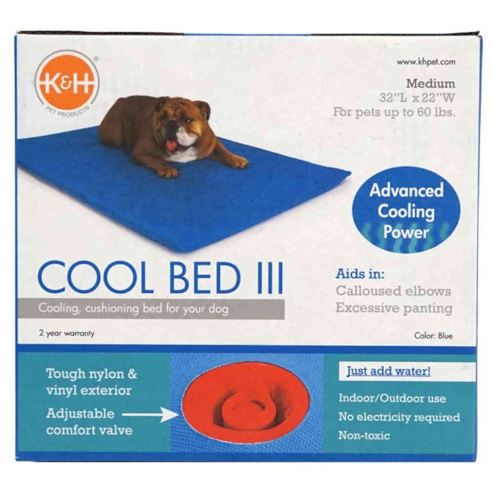 K&H Cool Bed III packaging for dogs with a blue cooling pad and dog lying on it.