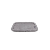 Gray textured bath mat on a white background