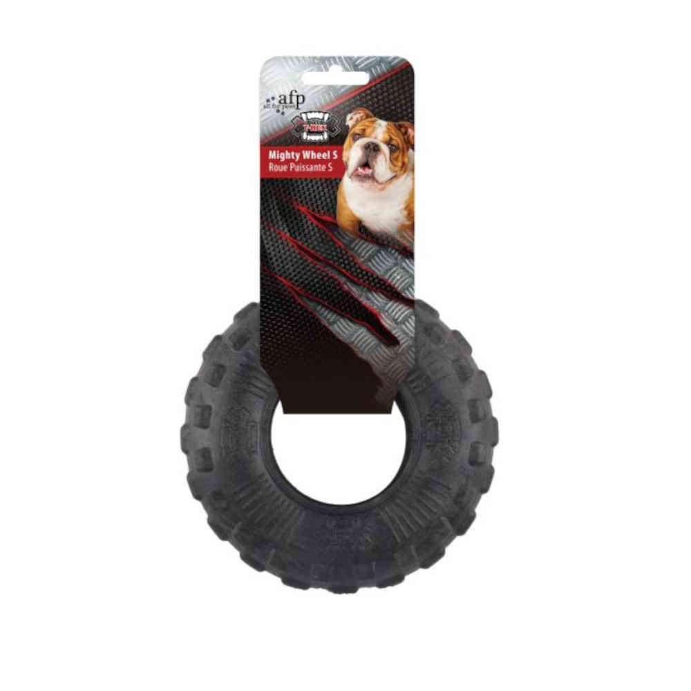 Dog toy with tread pattern on a white background, featuring a packaging label with a dog illustration.