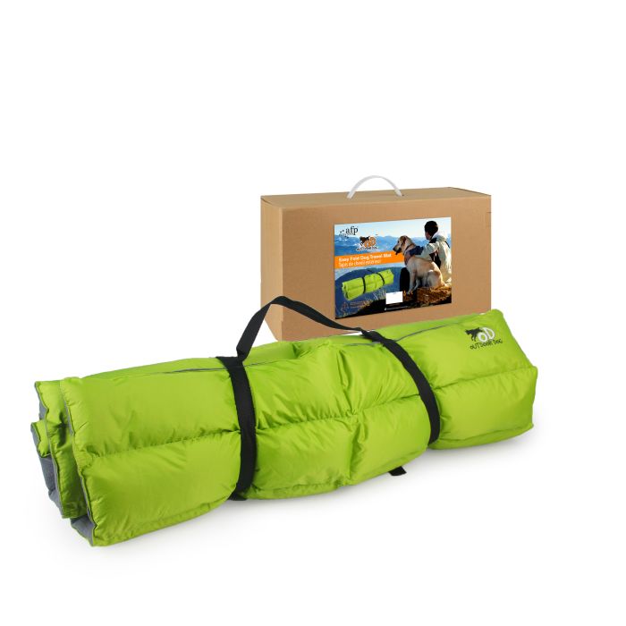 Green inflatable mat with black straps and a cardboard box on a white background