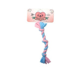 Pink and blue braided dog toy with 'Puppy Love' packaging on a white background