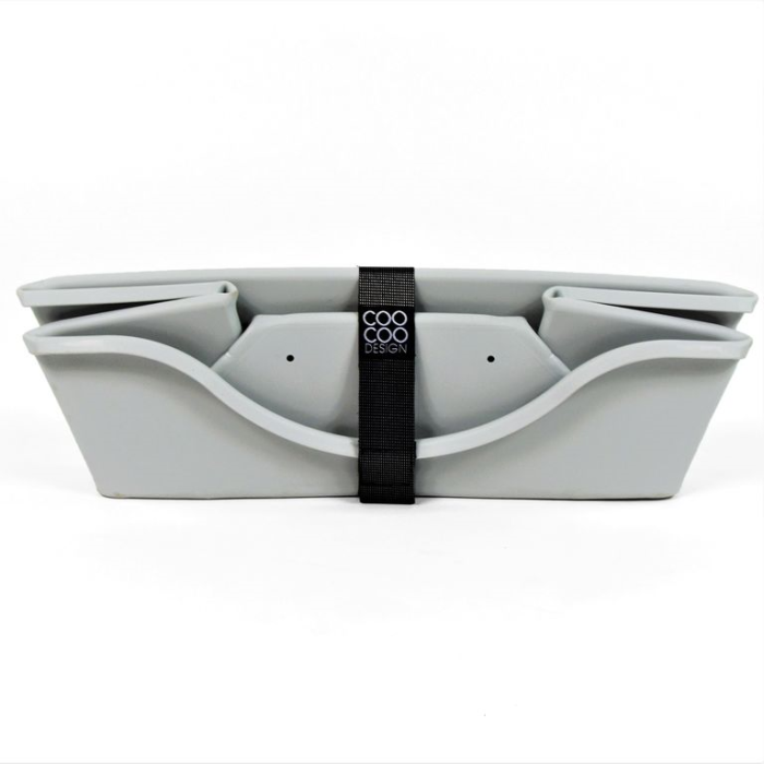 Gray pet bed with a black strap on a white background